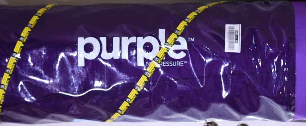 Purple mattress in a bag