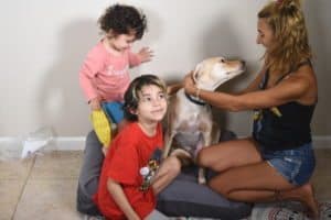 2 kids, a dog and a woman on a casper dog mattress