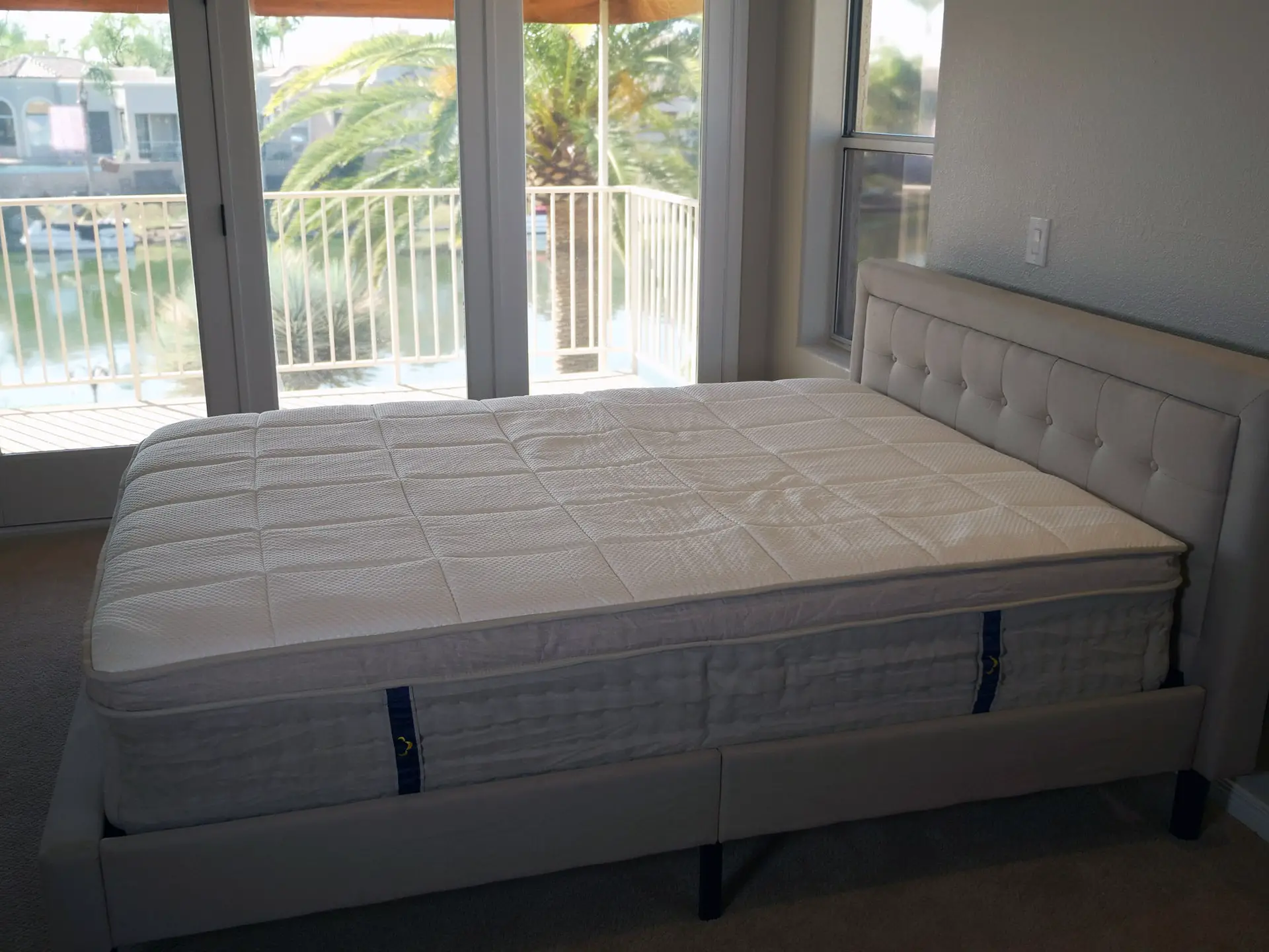 DreamCloud mattress on bed frame