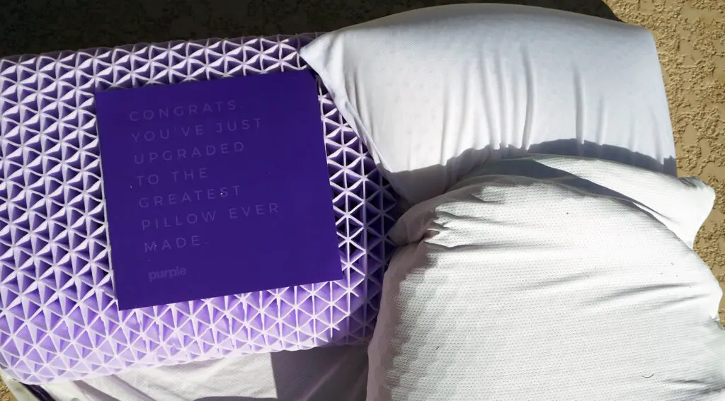 purple pillow on left purple harmony pillow on right